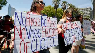 Coronavirus Conspiracy Theories and Reopen Protests as Death Denial